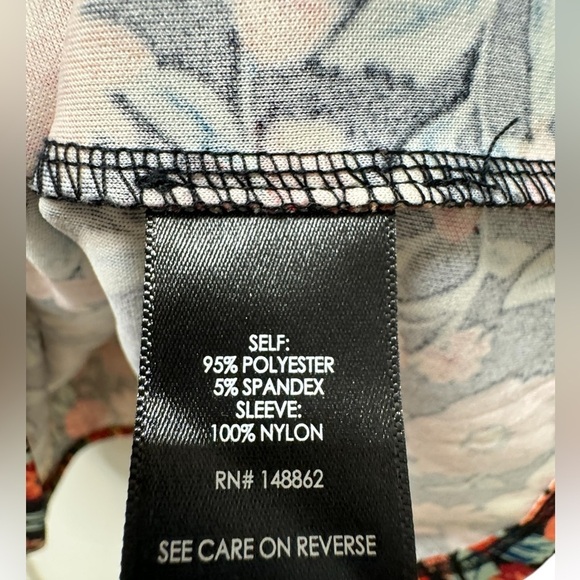 Torrid Mini Scuba Crepe And Organza High Neck
Puff Sleeve Dress - Picture 8 of 10